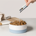 Load image into Gallery viewer, A sachet of ZamiPet High Strength Probiotics+ Gut Protect, torn open with content being sprinkled onto a bowl of dry dog food.